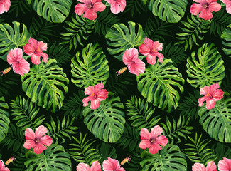 Seamless pattern with monstera and palm leaves on dark background.Tropical camouflage print.