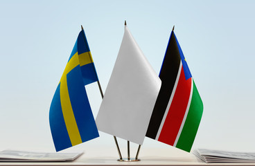 Flags of Sweden and South Sudan with a white flag in the middle