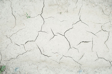 In the summer of 2017, rains were sparse so the earth withered and cracks appeared on it. It turned out an interesting texture of the earth.Photo in the style of minimalism