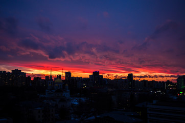 A magnificent sunset in the city of Ekaterinburg struck the inhabitants with its beauty. The day is not over yet, because it's getting dark early in the winter.