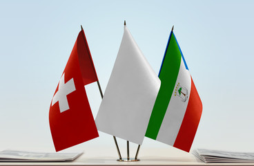 Flags of Switzerland and Equatorial Guinea with a white flag in the middle