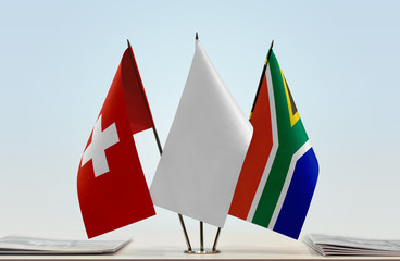 Flags of Switzerland and Republic of South Africa with a white flag in the middle