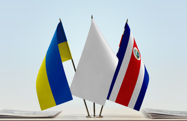 Flags of Ukraine and Costa Rica with a white flag in the middle