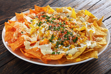 close-up of crunchy nachos with cheese