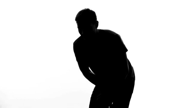 Young man suffering from cystitis disease, bladder inflammation, men health