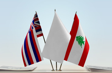 Flags of Hawaii and Lebanon with a white flag in the middle