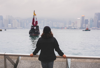 Traveler in Hong Kong Victoria Harbor