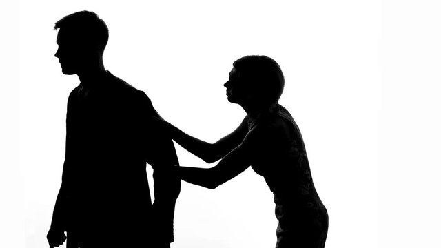 Young woman apologizing to boyfriend, relationship problem, misunderstanding