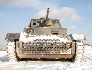 Fototapeta na wymiar vintage old rusty tank in winter