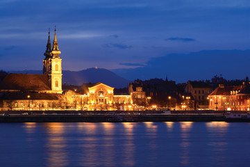 Buda side riverfront of Budapest city with st. Anna church at night