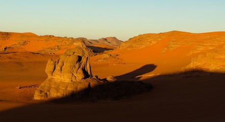 Fototapeta na wymiar Sunrise view to Tin Merzouga dune at Tassili nAjjer national park, Algeria