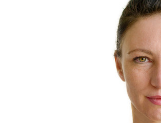 Obraz premium Half face portrait of an attractive brunette