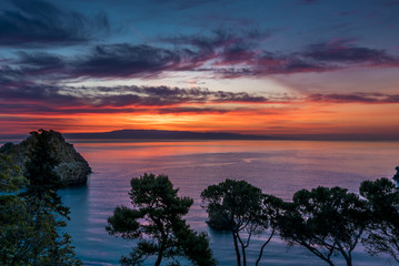 Naklejka na ściany i meble Colorful sunrise over the Mediterranean sea