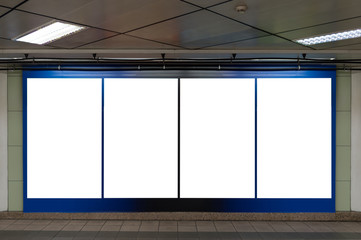 Fototapeta premium Large blank billboard on a street wall, banners with room to add your own text