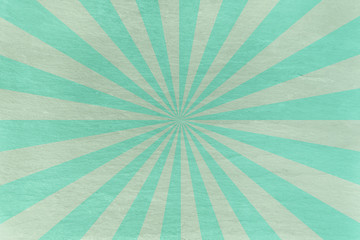 Aqua and mint green slate background - with retro starburst in alternating stripes - abstract pastel stone background