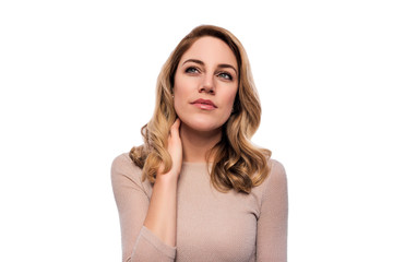 Fototapeta premium Attractive blond young woman. Portrait of a beautiful woman on a white background.