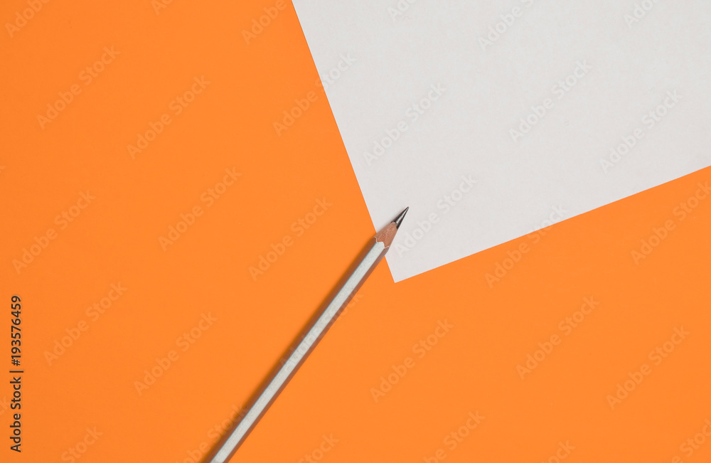 Poster minimalistic background for copy space, white sheet of paper. pencil on an orange background..