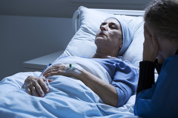 Dying elderly woman with tumor - obrazy, fototapety, plakaty