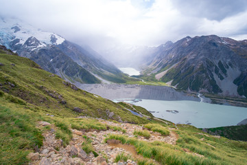 Beautiful scene green nature and rocky mountain with glacier over the Mt Cook National park (Muller hut track)