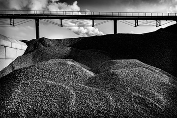 Heaps of gravel on industrial site