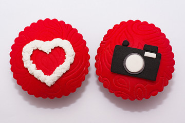 Multicolored cupcakes on a white background.