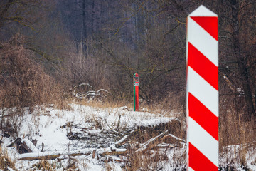 Border poles of Poland and Belarus seen from Mostowlany, small village in Podlasie ergion of Poland