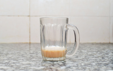 Unfinished Teh Tarik Or Pulled Tea a famous sweet milk tea in Malaysia.