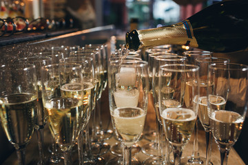 Champagne poured into glasses