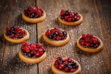 Delicious berry fruits mini tarts