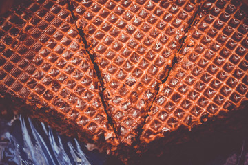 Sweet waffle cake with chocolate closeup view
