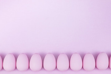Flat lay of Easter eggs mockup background, view from above with copy space for text.pink concept of stylish
