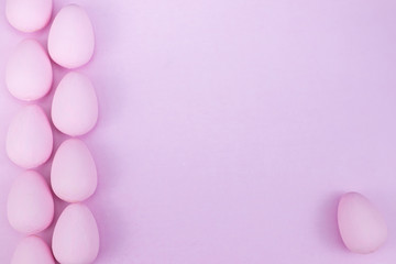 Flat lay of Easter eggs mockup background, view from above with copy space for text.pink concept of stylish