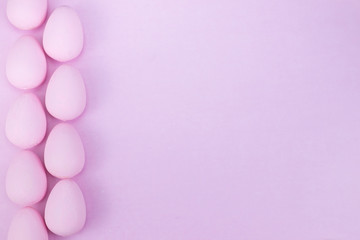 Flat lay of Easter eggs mockup background, view from above with copy space for text.pink concept of stylish