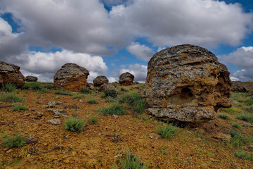 Shirkala. West Kazakhstan. In the boundless steppe around the famous mount Shirkala scattered huge picturesque stone balls-nodules.