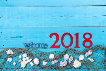 Welcome sign with year 2018 in bold red with fish net and seashells border; vacation sign with painted copy space