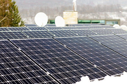 Photovoltaic panels, alternative renewable energy - close up of solar battery panels
