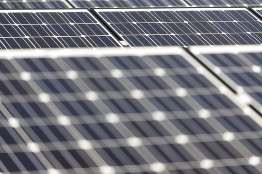 Photovoltaic panels, alternative renewable energy - close up of solar battery panels