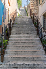 Fototapeta na wymiar stone staircase / Stone staircase in Verona in Italy 