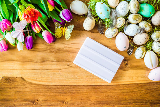 Blank light box with free copyspace and easter and spring decorations from above