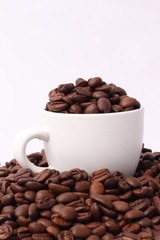 coffee bean with coffee cup isolated on white