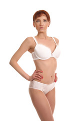 Obraz premium young female body in white lingerie