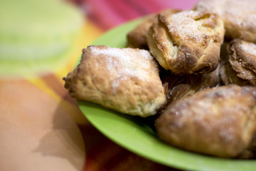 Biscuit cookies with sugar, cooked, lies in a plate on the table