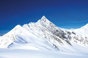 Winter mountain with white peak in France