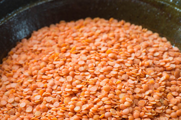 red lentil in clay bowl