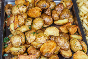 Vegetarian skewers with potatoes cooked on the grill.