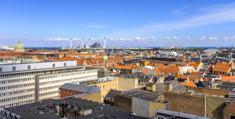 Fototapeta premium Denmark - Zealand region - Copenhagen city center - panoramic aerial view of the central Copenhagen and outskirts in the background