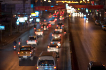 Fototapeta na wymiar Night traffic jam with colorful bokeh,blur focus.