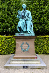 Obraz premium Denmark - Zealand region - Copenhagen city center - royal King’s Garden Kondens Have park and a statue of the writer Hans Christian Andersen
