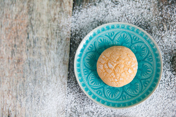 Homemade orange cookie with cracks