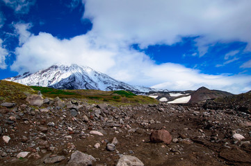 Mountain landscape: view on active Koryaksky Volcano on a sunny day. Koryaksky-Avachinsky Group of Volcanoes, Kamchatka Peninsula, Russia, Far East